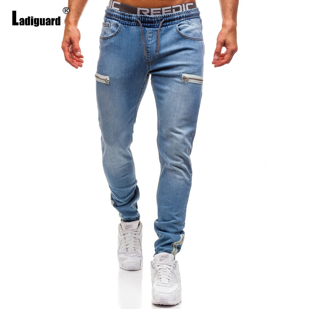 

Ladiguard 2023 Men's Pencil Demin Pants Europe Fashion Zipper Cuff Demin Trousers Plus Size Mens Elastic Waist Jeans Sweatpants