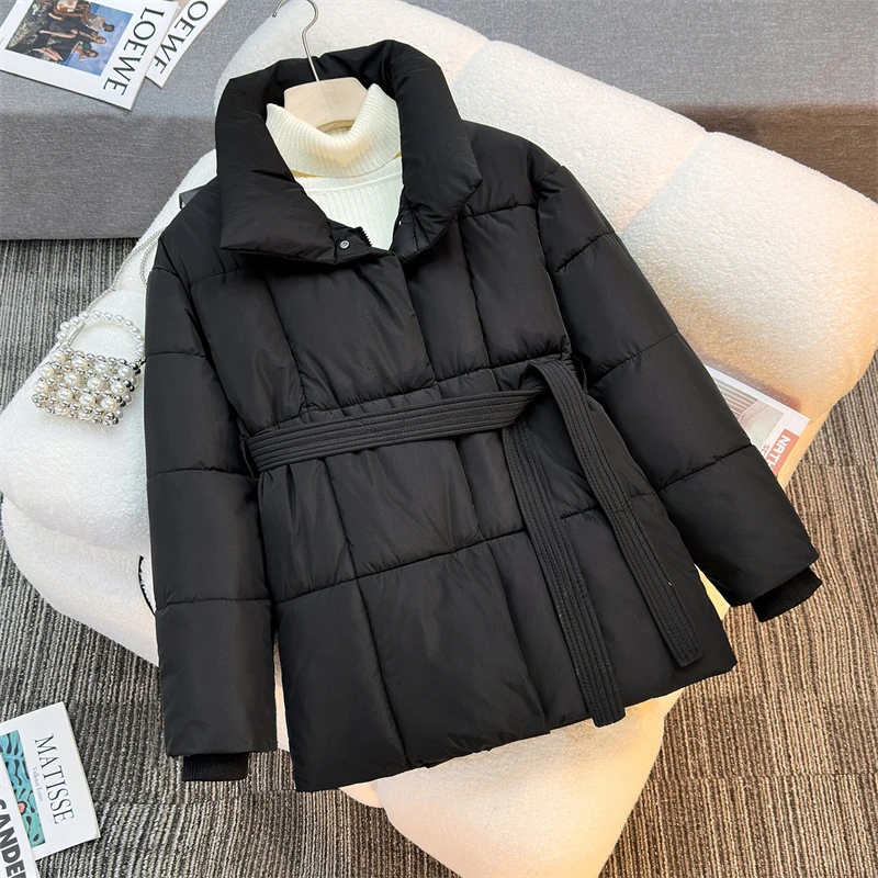Chaqueta de plumón de invierno para mujer, chaquetas acolchadas de algodón ruso, cinturón delgado, temperamento, Parka larga gruesa y cálida, prendas de vestir holgadas y ajustadas, tendencia