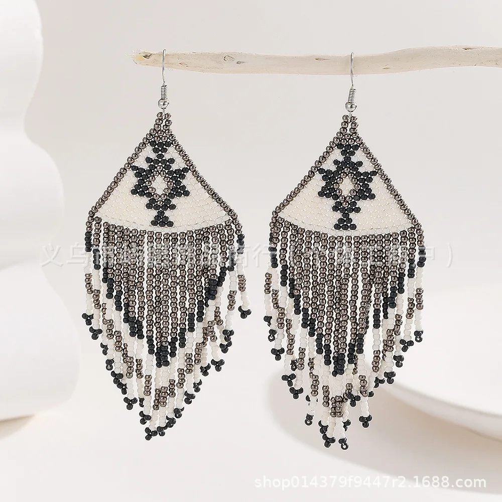 

Beaded earrings Tassel Originality Design Geometry Hand knitting Bohemia Alloy Tide Simple Retro Rice bead earrings