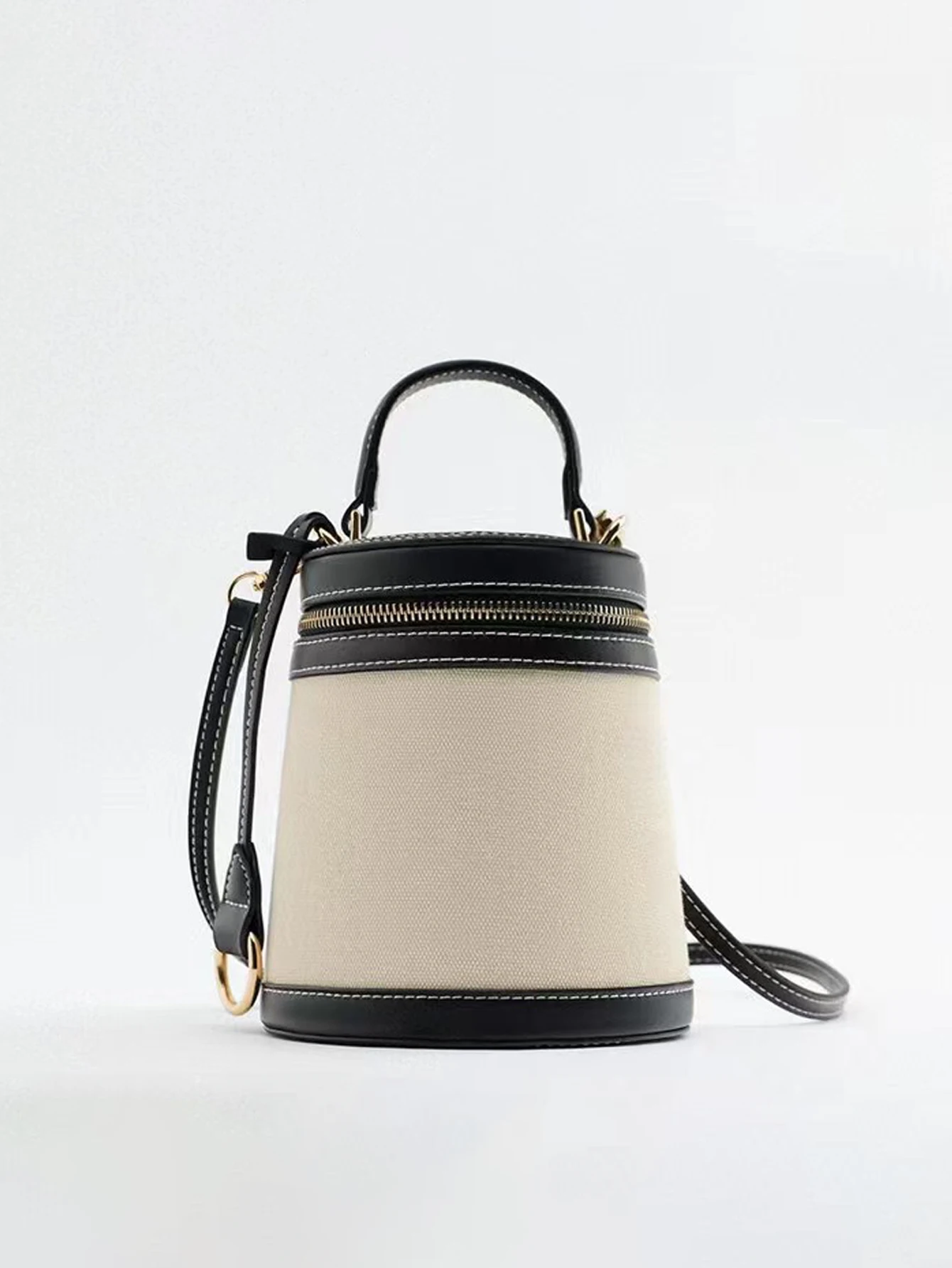 

2024 fashion women's bag spring and summer new cylinder color box shape single shoulder oblique bag canvas bag bucket bag