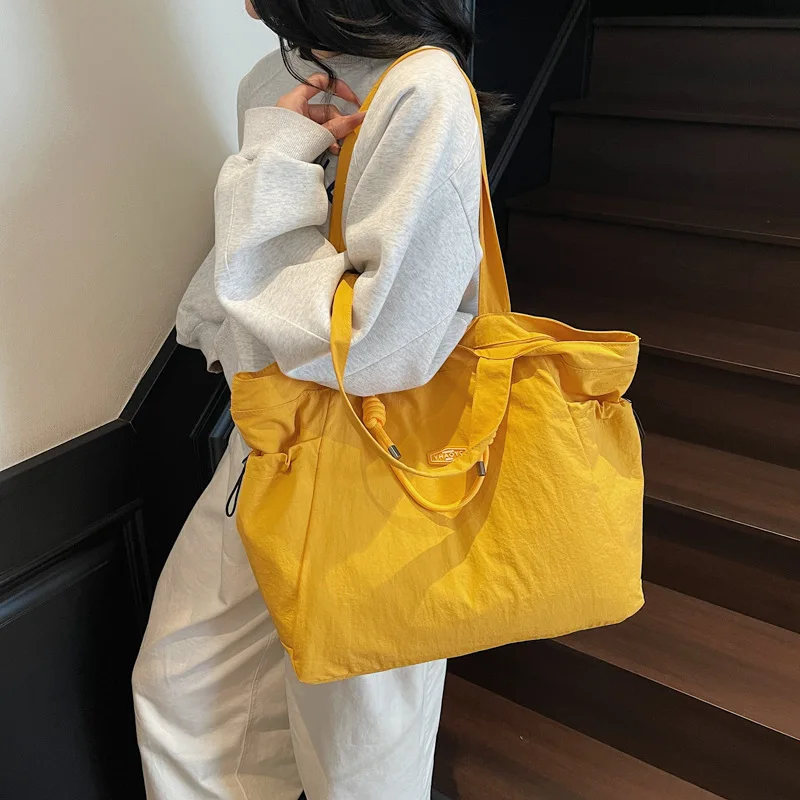 

Fashion Solid Color Women's Totes Bag Large Capacity Versatile Nylon Shoulder Bags Casual Zipper Commuting Handbag Bucket bag 가방