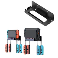 Soporte de Pared para Nintendo Switch 2/Switch 1, Modelo PG-SW2072: Soporte de Pared de Almacenamiento con 5 Tarjeteros y 4 Soportes Joy Con