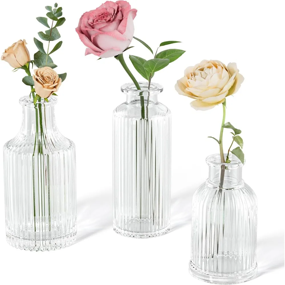 

A set of three glass vases, small ribbed vases, transparent retro glass vases for dining table decoration