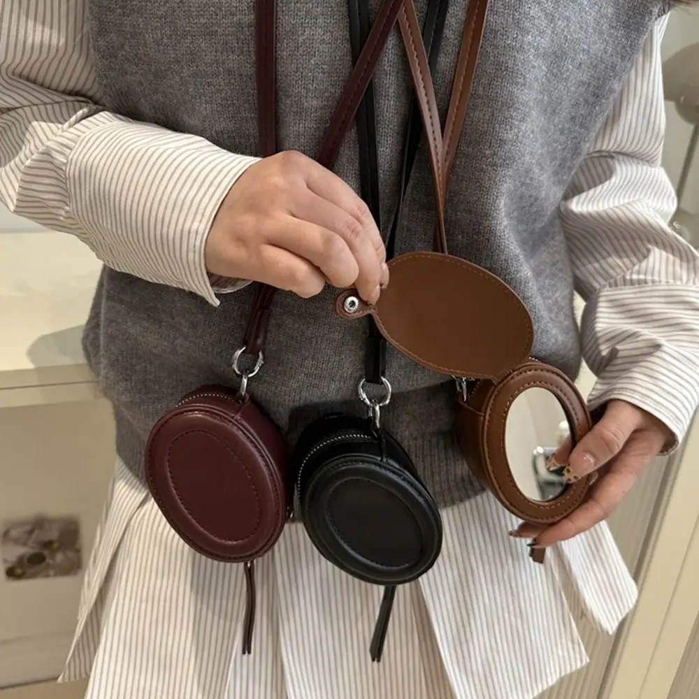 

Элегантный кошелек для монет из искусственной кожи, овальный с зеркалом для макияжа, сумка для наушников, круглая сумка через плечо в корейском стиле для покупок