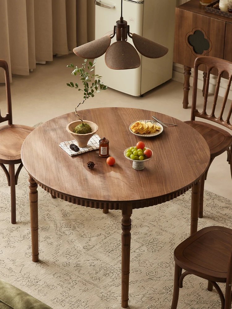 

North American black walnut dining table round small apartment medium and ancient style restaurant solid wood round table chair