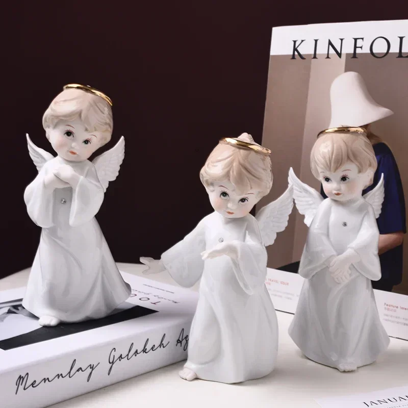 

Cute ceramic figurine angel sculpture living room table decoration angel ceramic statue Crafts Ornaments home decor wedding gift