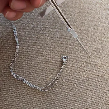 Collana con croce retrattile in acciaio inossidabile catene ...