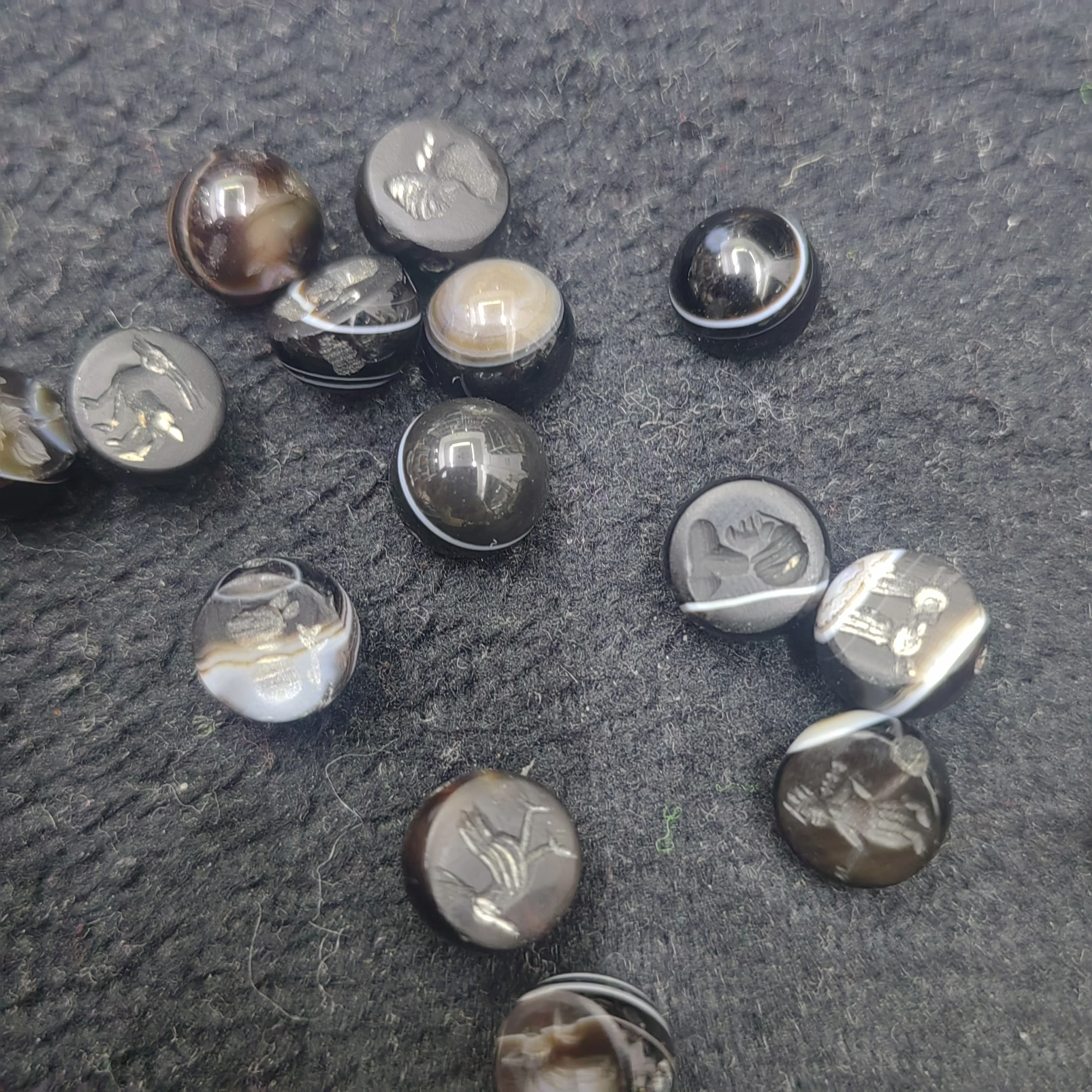 Ancient Sassanian seals in the form of animals figures insects plants flat hemispherical ancient beads made of agate cryst
