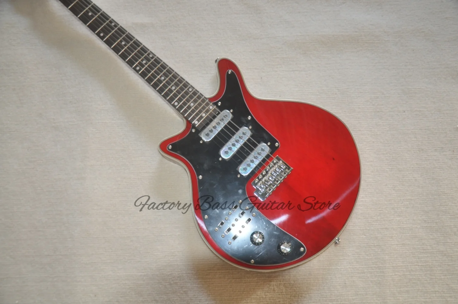Classic left-handed guitar, transparent red guitar, solid wood body, rosewood fingerboard, SSS pickups, black pickup plate.
