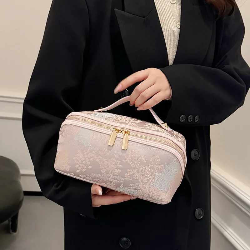 China Elegant Embroidered Makeup Bag Women's Portable Travel Large Capacity Toilet Storage Bag for Daily Use