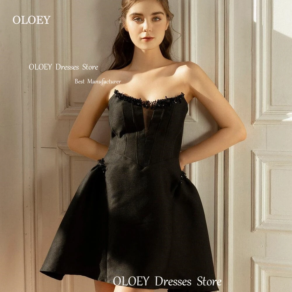 

OLOEY Simple Black Mini Evening Dress Beading Crystal Prom Dress Corset Homecoming Party Dress Formal Occasion Cocktail Gowns