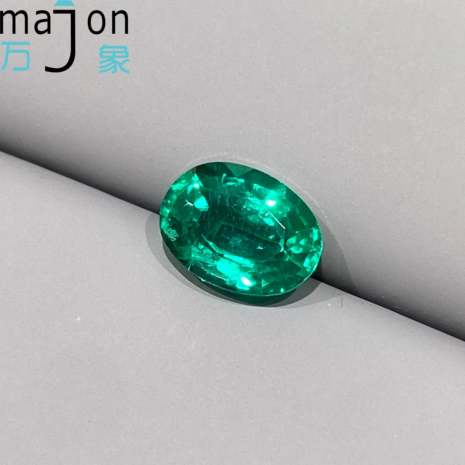 1.24CT شكل بيضاوي مختبر نمت الزمرد أحجار كريمة مفكوكة الاصطناعية كولومبيا حجر الزمرد مع شهادة AGL للمجوهرات