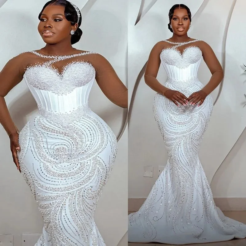 Suknia ślubna syrena na zamówienie dla panny młodej, suknie ślubne z prześwitującym dekoltem, odpinany tren, aplikacje, koraliki, koronka, perły, kryształy