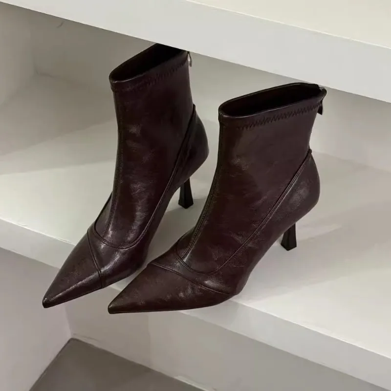 العلامة التجارية مصمم 2025 المرأة شتاء جديد بولي PU مقاوم للماء تشيلسي الأحذية اليومية عادية تنوعا المرأة خنجر الكعب حذاء من الجلد