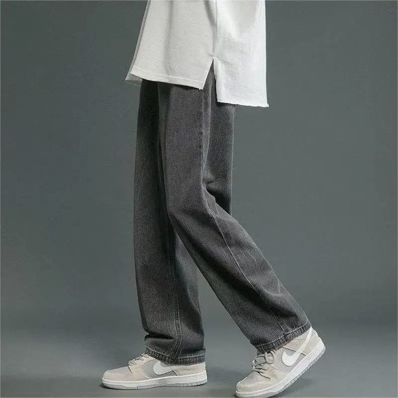 กางเกงยีนส์ผู้ชายเอวยางยืดใหม่กางเกงทรงหลวมสไตล์ฮ่องกงกางเกงทรงสลิม