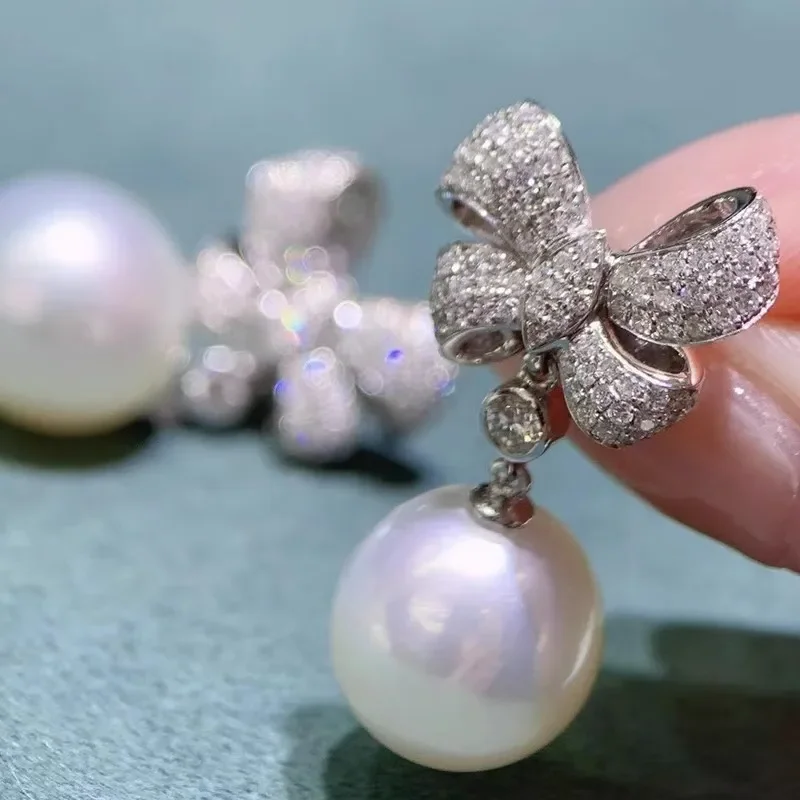 Huitan Wunderschöne Schleifen-Tropfenohrringe für Frauen, zartes Verlobungszubehör mit brillantem Zirkonia, zierlicher Schmuck für Damen