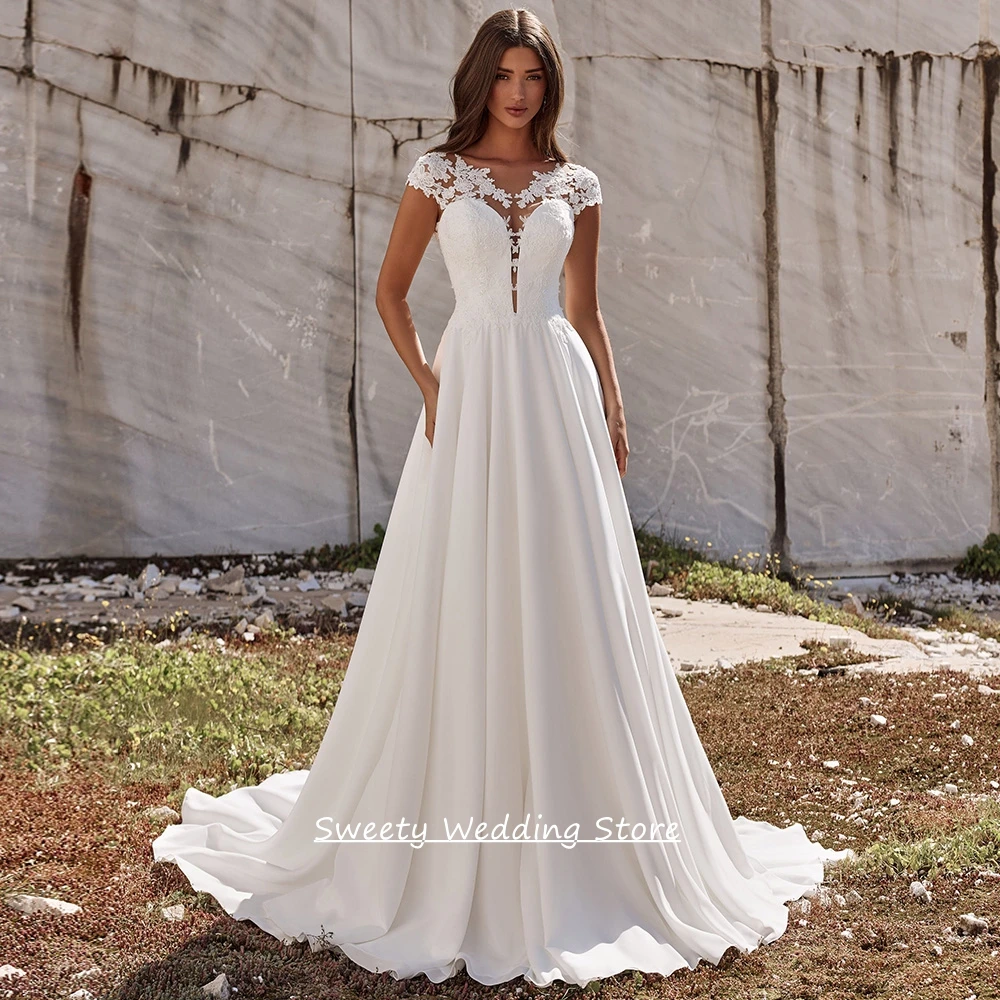 Customized Cap Sleeve Scoop Neck Wedding Dress Fashion Lace Applqiue Illusion Back Buttons A Line Bridal Gown for Bride