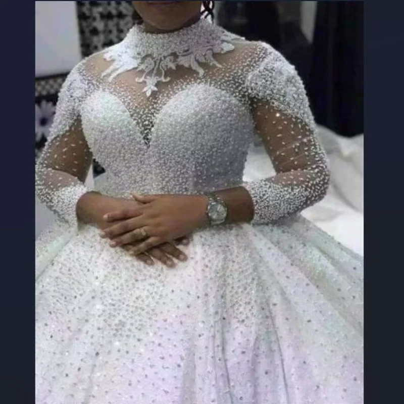 Customized Spring Luxury Heavy Pearls Beaded Wedding Dresses Long Sleeves High Neck Bling Bling Ball Gown Plus Size African Wedd