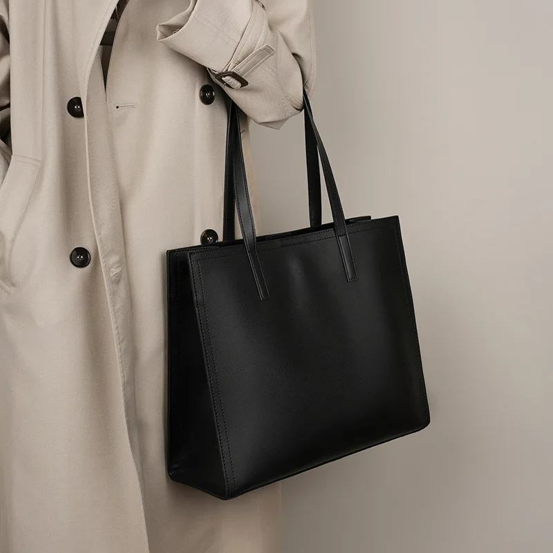 

New niche tote bag, women's leather large-capacity briefcase, computer bag, black cowhide commuting large bag