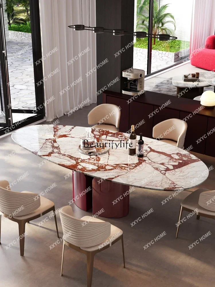 Imported natural marble dining table, water drop-shaped high-end oval light luxury high-end red luxury stone dining table
