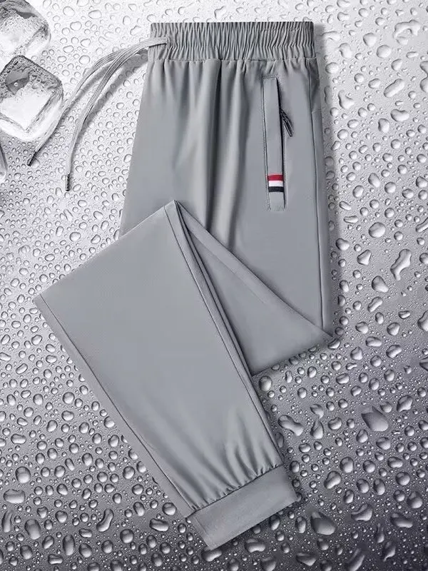 アイスシルクカフスパンツメンズ夏の新スタイルスポーツカジュアルルーズフィット通気性快適なストレートレッグパンツポリエステル繊維