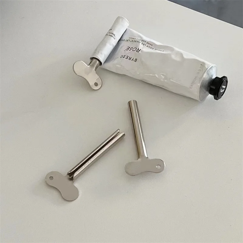 

Брелок для ключей, соковыжималка для зубной пасты, ручной металлический сплав цинка, нержавеющая сталь, соковыжималка для крема для рук, держатель для зубной пасты, бытовой