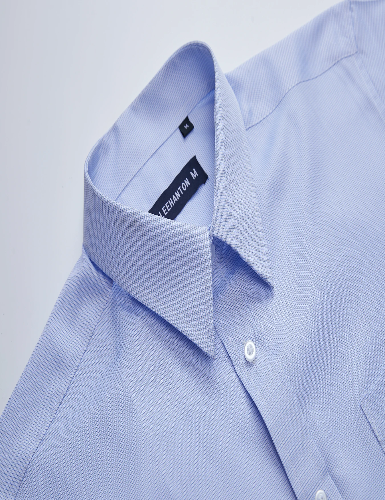 Kemeja lengan panjang kasual modis pria kerah warna solid sederhana atasan bisnis kasual ringan dan sejuk