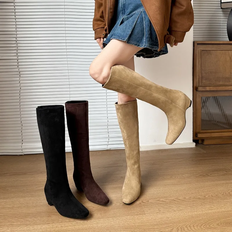 2026 automne hiver nouvelle French tempérament daim pile bottes longues femmes à talons épais surélevés dans la tête