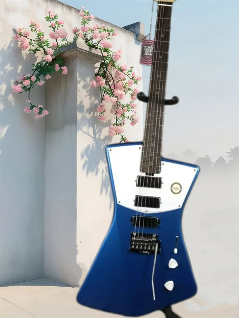 

Sterling by Music Man STV60 . Vincent Phlham Blue Electric Guitar Bevel Top, 3 Mini humbucker Pickups, Tremolo Bridge