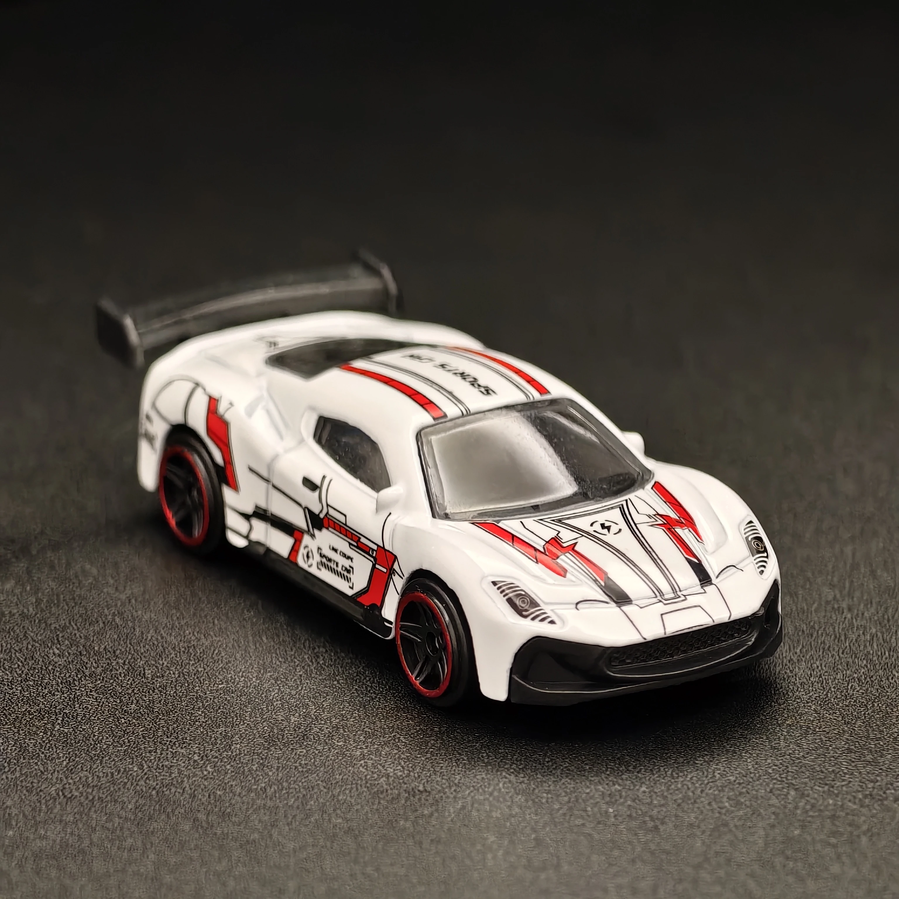 1/64 MC20 Diecast Alloy Sports Car Model White Track Car with Red Graphics and Black Rear Spoiler Mini Metal Toy for Collectors