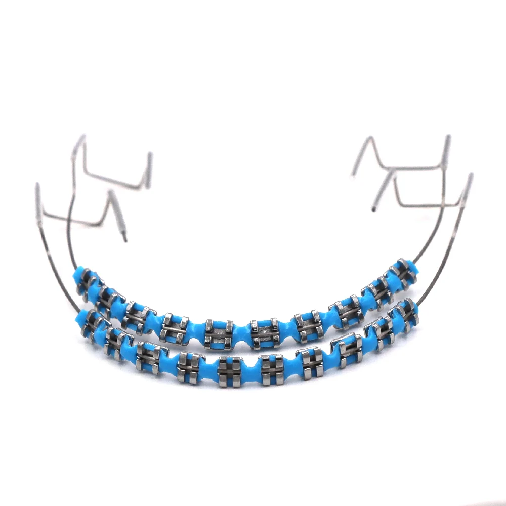 Modisches Fake-Zahnspangen-Set – Bunte kieferorthopädische Ligaturbinder und Metallklammern |   Sicher und bequem |   1 Paar