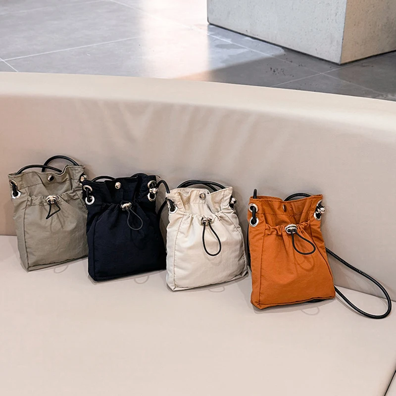 Bolsa de ombro multifuncional simples e versátil estilo INS