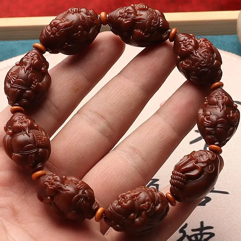 

Brush Jadified Material Olive Nut Carved Eight Mammon Red Jasper Men Crafts Handle Hand Toy Bracelet
