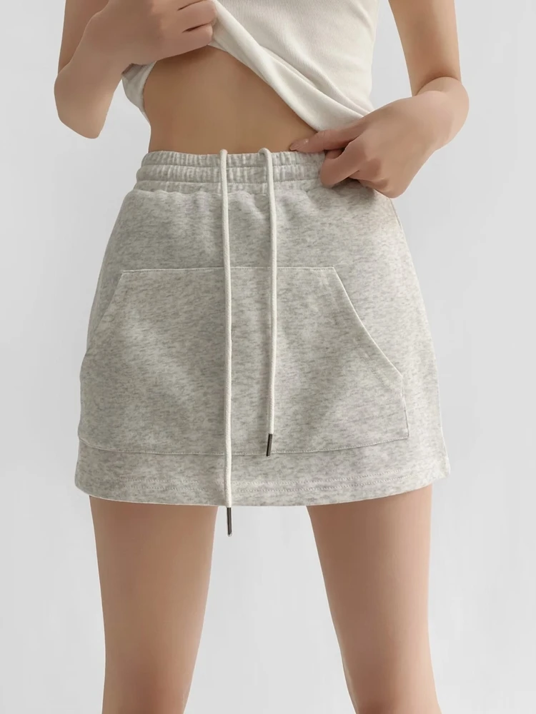 Nuevo conjunto de moda de verano para mujer, cseta de manga corta con cuello redondo y falda informal con cordón, conjunto...