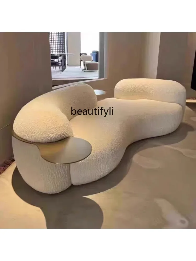 

07Italian minimalist designer with curved living room, lamb velvet clothing store, reception, pea sofa, cream, and quiet breeze
