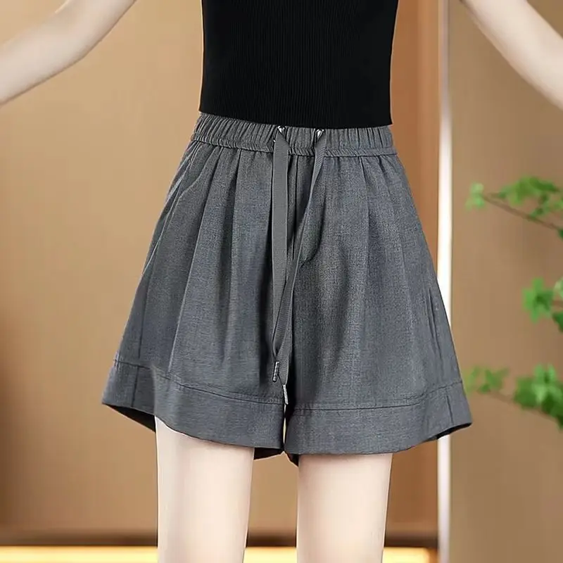 Simplicity Casual New Summer Solid Ice Silk Women's Elastic Waist Drawstring Pocket Fashion Loose High Waist Wide Leg Shorts