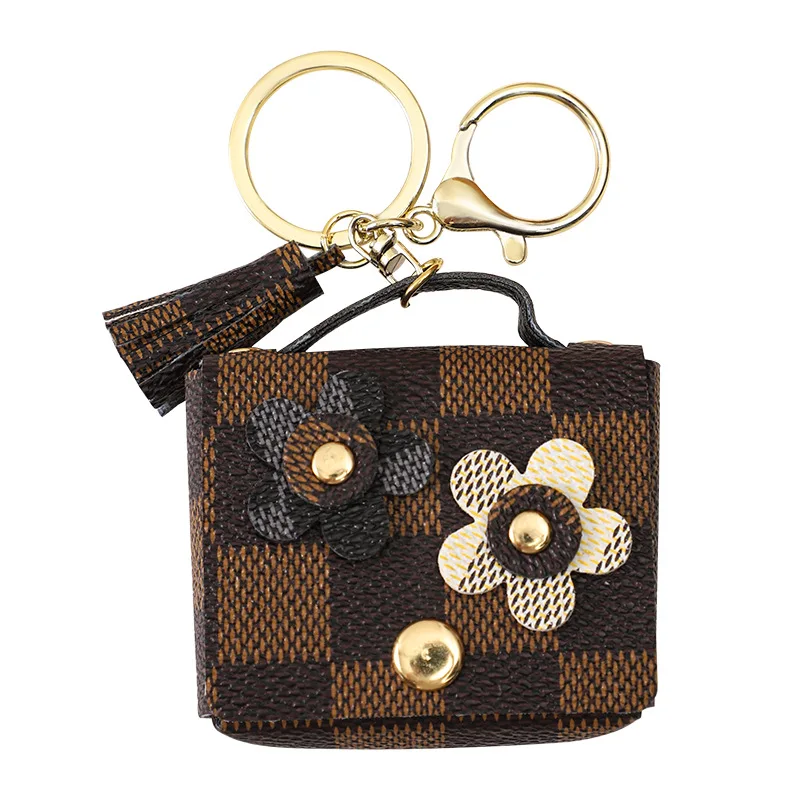 Miniso leather flower earphone case keychain pendant, cute monogram girl bag key chain