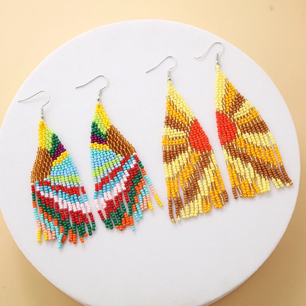 

Rice bead earrings Scenery Colorful sun Originality Pattern Fashion Bohemia Hand weaving Alloy Simplicity Beaded earrings