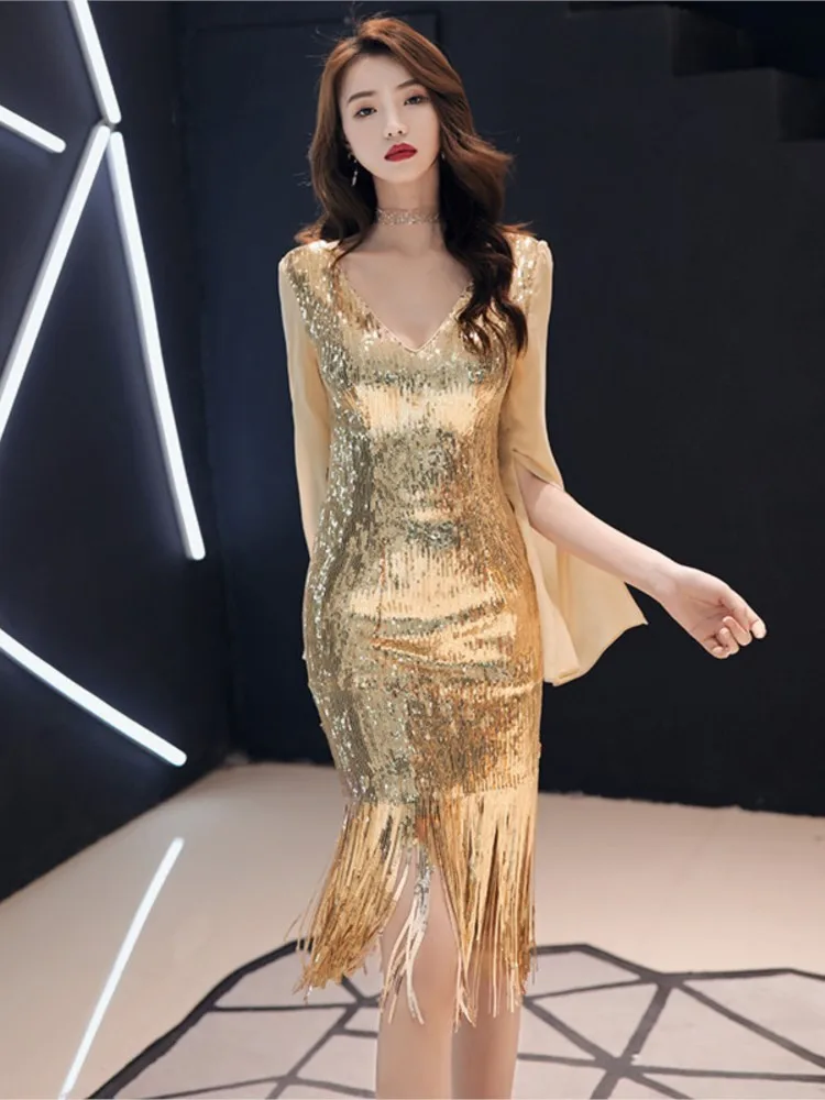 

A new and elegant fishtail golden mid-length light luxury dress