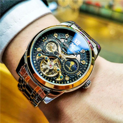 Elegante reloj mecánico automático para hombre, movimiento Tourbillon, diseño hueco, correa de acero inoxidable, esfera con pantalla de fase lunar, ideal para uso comercial o informal, diseño de reloj romántico de regalo para hombre, regalo para su mejor regalo, no requiere batería