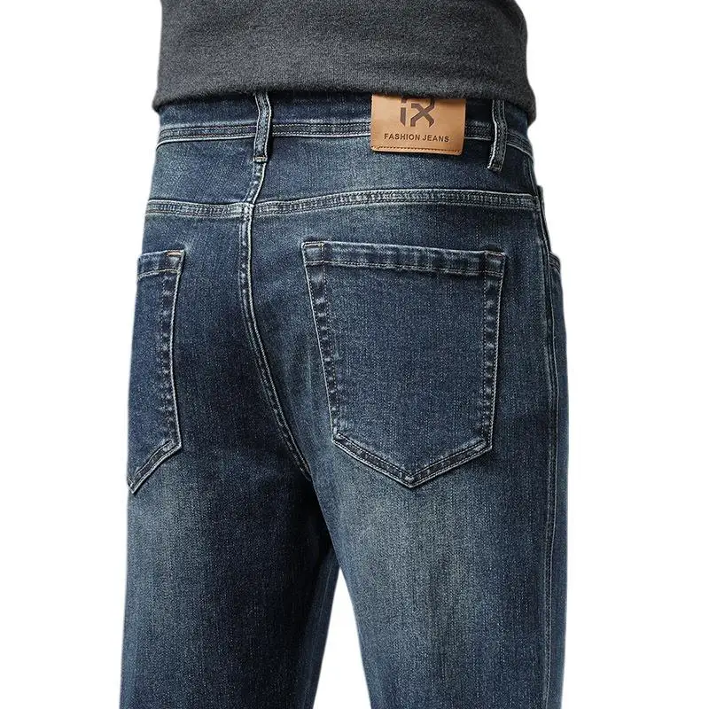 جينز مستقيم فضفاض غير رسمي مرن جديد للخريف والشتاء مناسب تمامًا للرجال