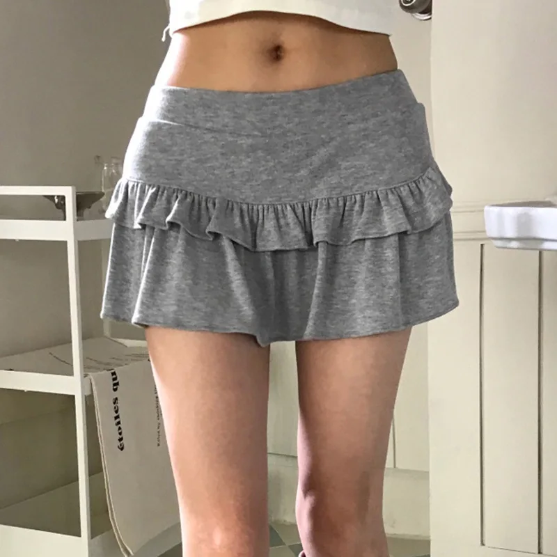 Falda corta pequeña y fresca con borde de hongo, Color sólido, cintura baja, picante, para niña, artículo nuevo 2024