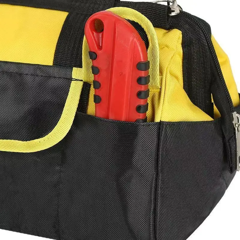 

Portable tool bag with shoulder strap made of PVC material