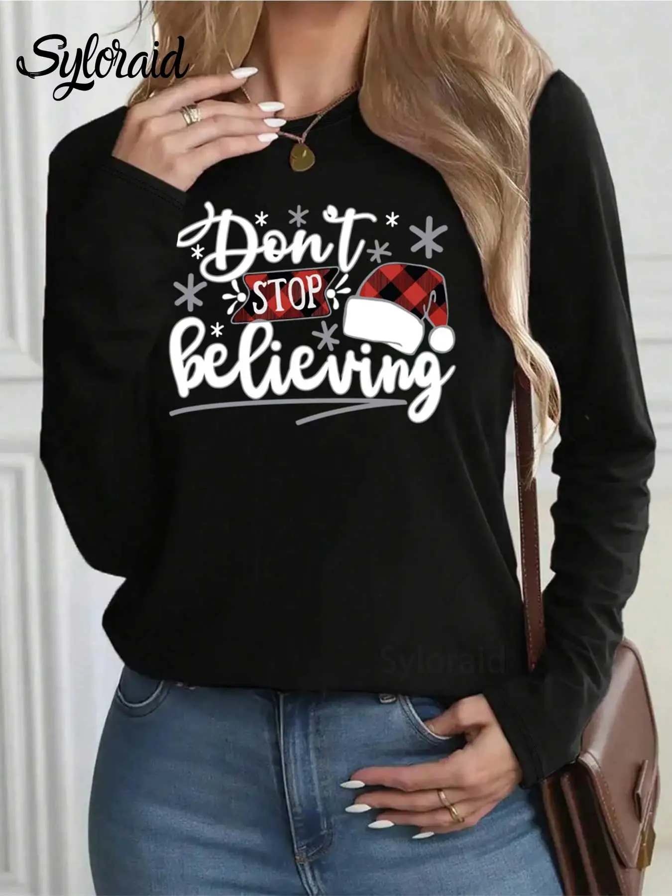 レディース長袖Tシャツ「Don't Stop Believing」クリスマスハットプリントTシャツファッションラウンドネックカジュアルトップ