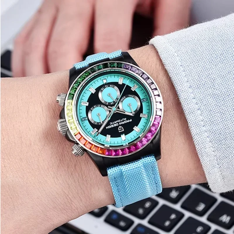 PAGANI DESIGN Men Automatic Watch,Rainbow Crystal Bezel,Multi-Function Calendar Dial,Light Blue Nylon Strap Luminous Mechanical