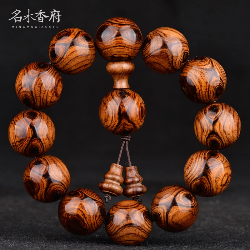 Advanced Dalbergia odorifera ghost eye ghost face sea yellow 2.0 Huanghua pear hand string men's literary play Buddha bead