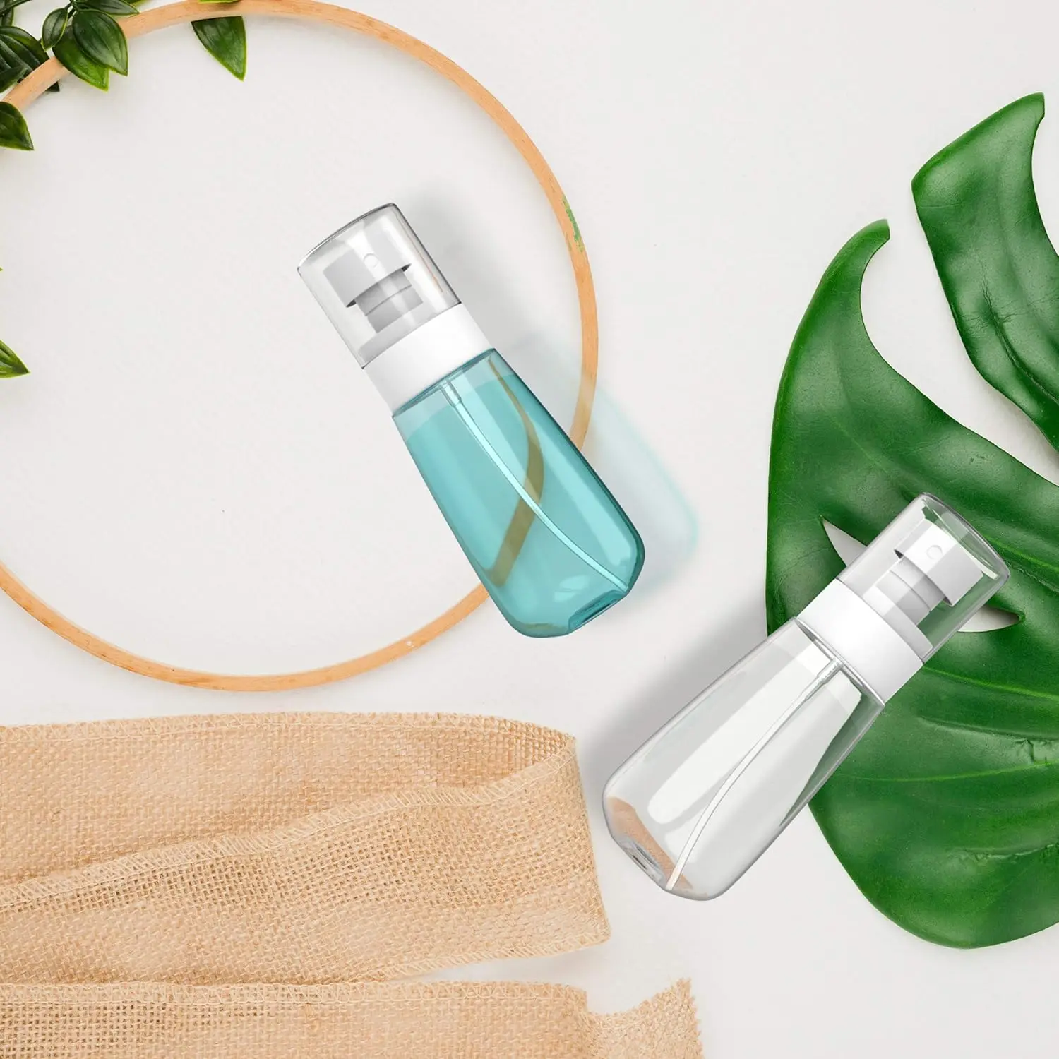 Pack 2 Botellas de spray pequeñas Tamaño de viaje 2 oz/60 ml - Mini botellas de spray vacías de niebla fina - A prueba de fugas - para tonificadores, cara y niebla para el cabello