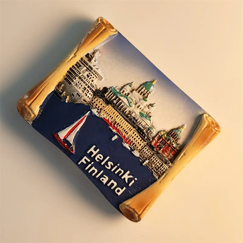 Helsinki, Finland: Tourist souvenirs, handmade painted decorative magnetic refrigerator magnets, made of resin.