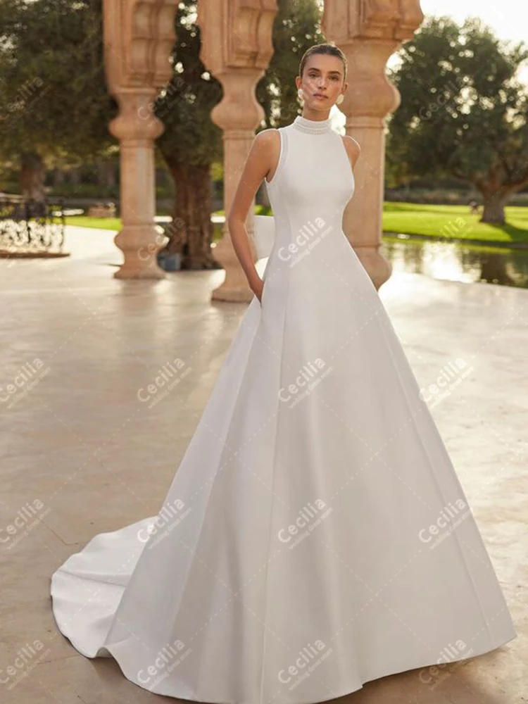 Abiti da sposa affascinanti Una linea di abiti da sposa in raso senza maniche Abiti moderni per la festa formale Abiti da sposa personalizzati 2025