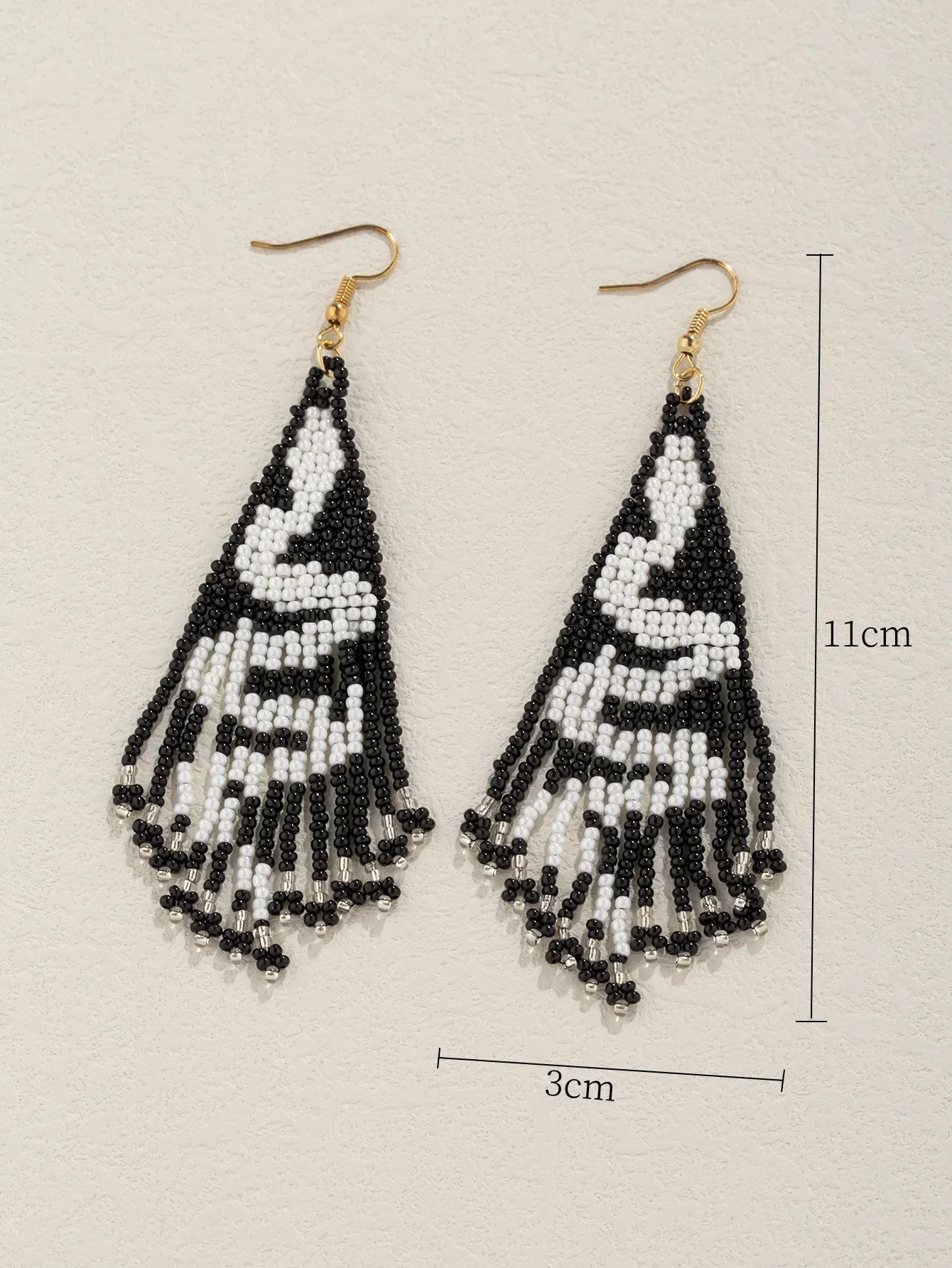 

Rice bead earrings Tassel The snake Design Originality Hand knitting Bohemia Alloy Fashion Female Simple Zoon Beaded earrings